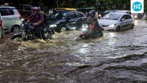 gurugram-under-orange-alert-as-heavy-rain-floods-roads,-disrupts-traffic