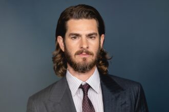 andrew-garfield-explains-the-robin-hood-energy-in-‘the-uprising’-—-and-why-marketing-noise-doesn’t-faze-him