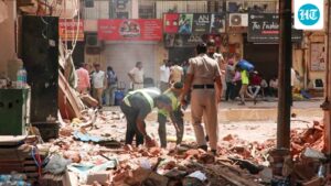 delhi-building-collapse-live:-demolition-of-structure-next-to-collapsed-pg-begins;-contractor-held-in-satya-niketan