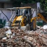madhya-pradesh:-houses-of-3-accused-in-banda-liquor-tragedy-demolished