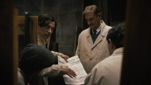 ‘words-are-weapons’:-michael-r.-roskam-on-turning-a-wwii-fake-newspaper-prank-into-a-heist-movie